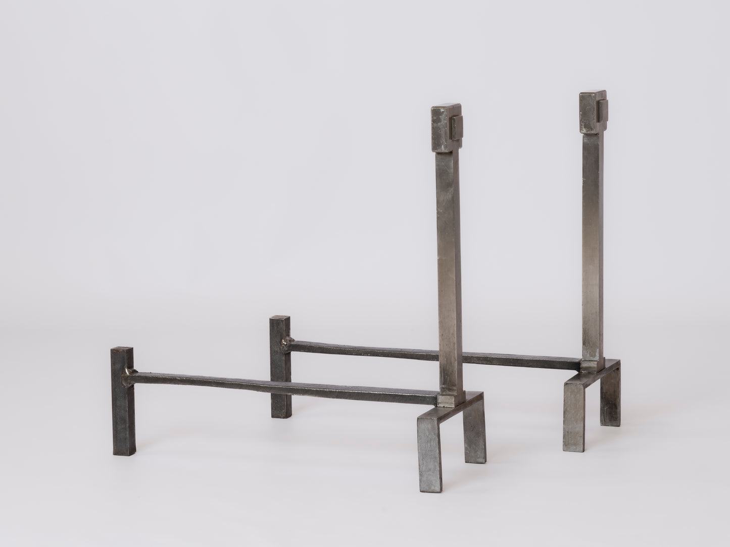 Big Size Modernist Stainless Steel Andirons in the style of Adnet - France 1970s
