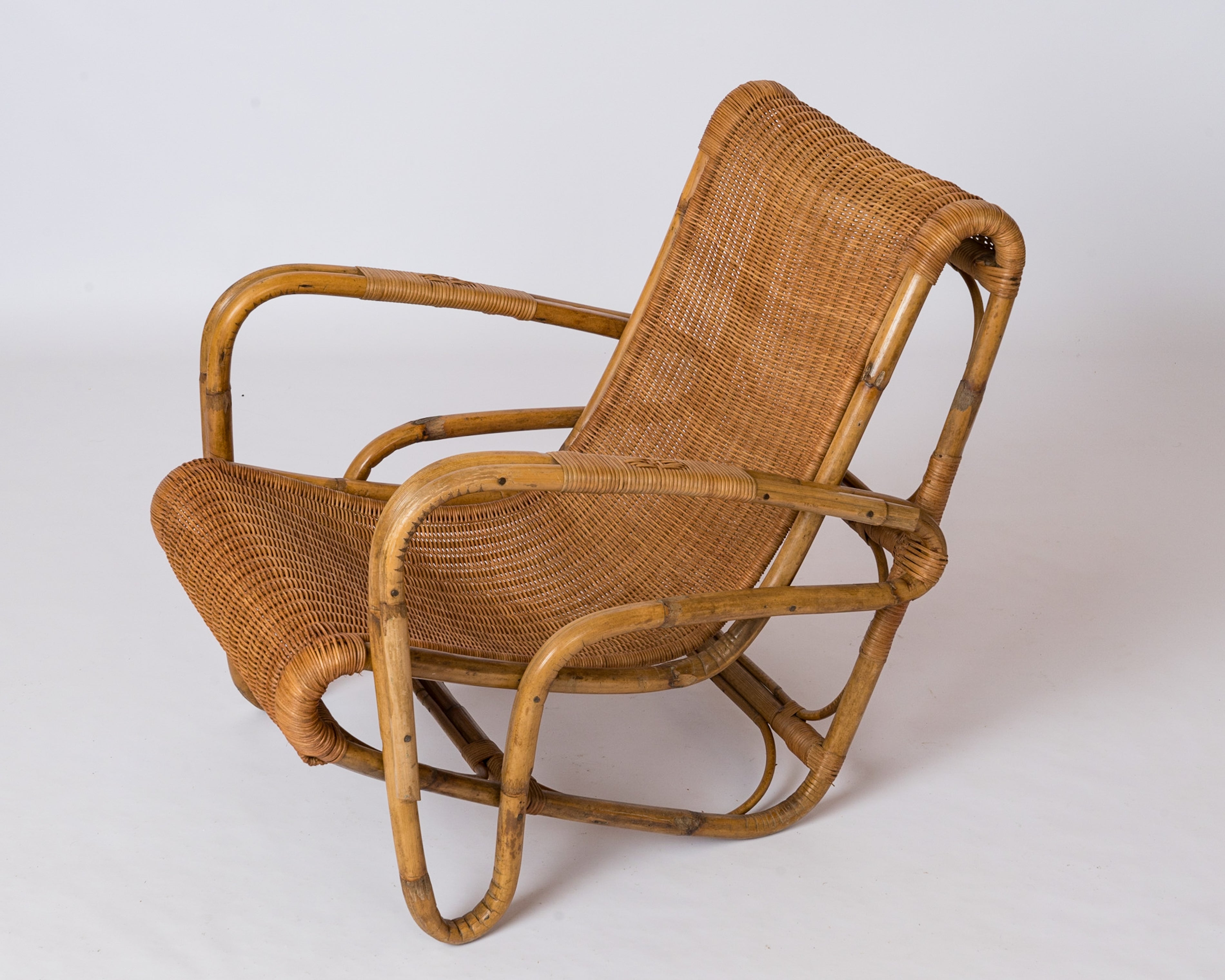 Rattan & Wicker Armchair in the style of Joseph André Motte - France 1960's
