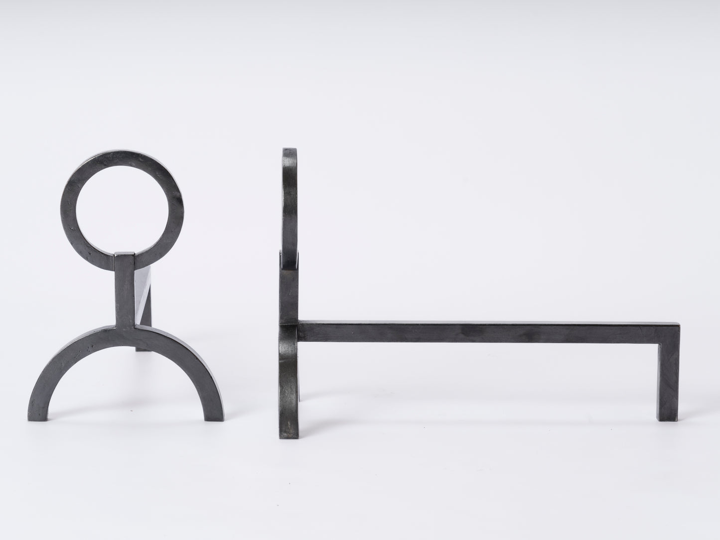 Neo Classical Graphite Andirons in the style of Adnet - France