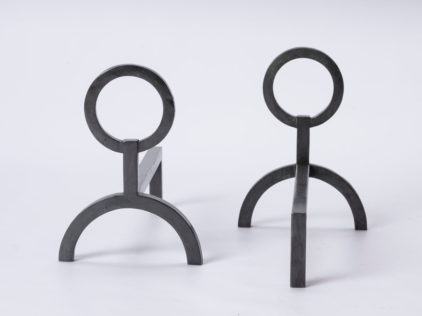 Neo Classical Graphite Andirons in the style of Adnet - France