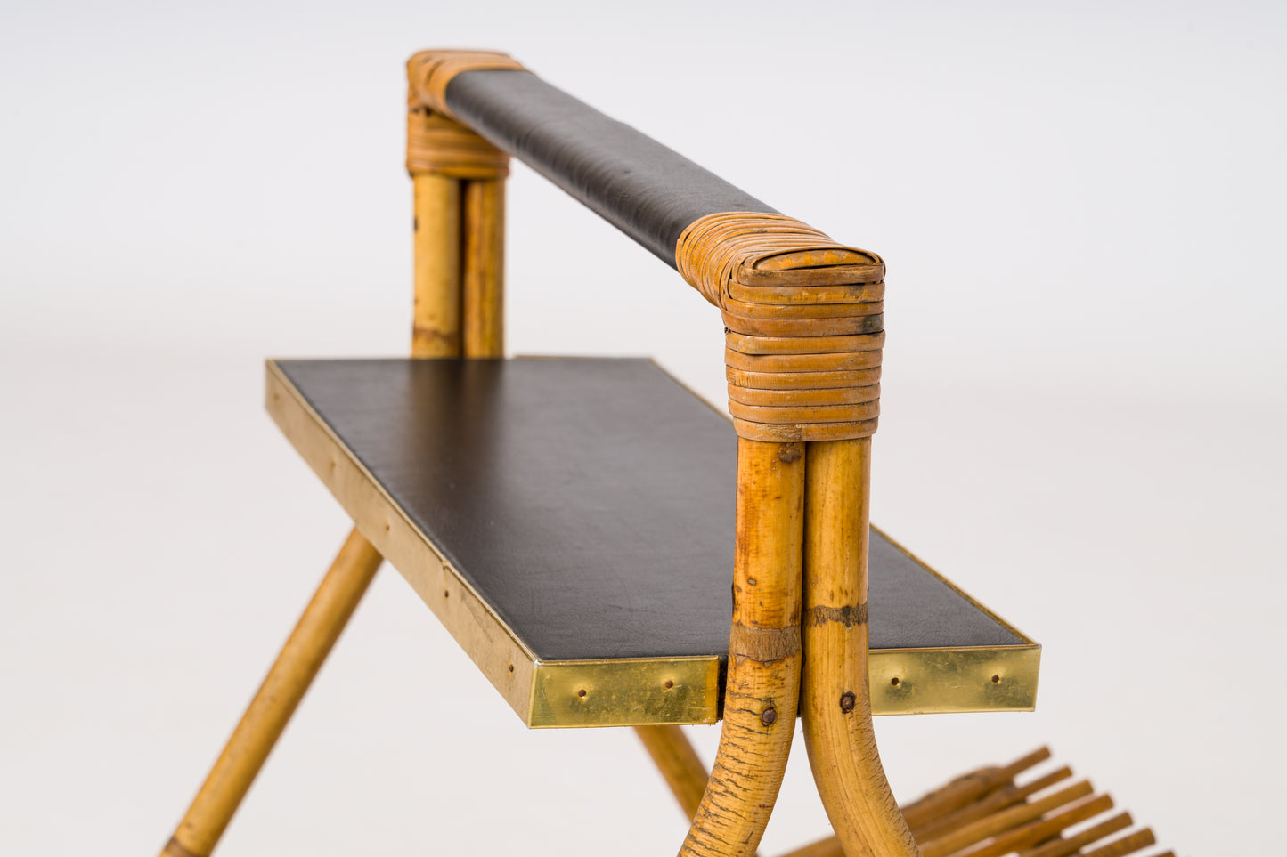 Rattan, Brass & Moleskine Magazine Rack in the style of Quinet - France 1960's