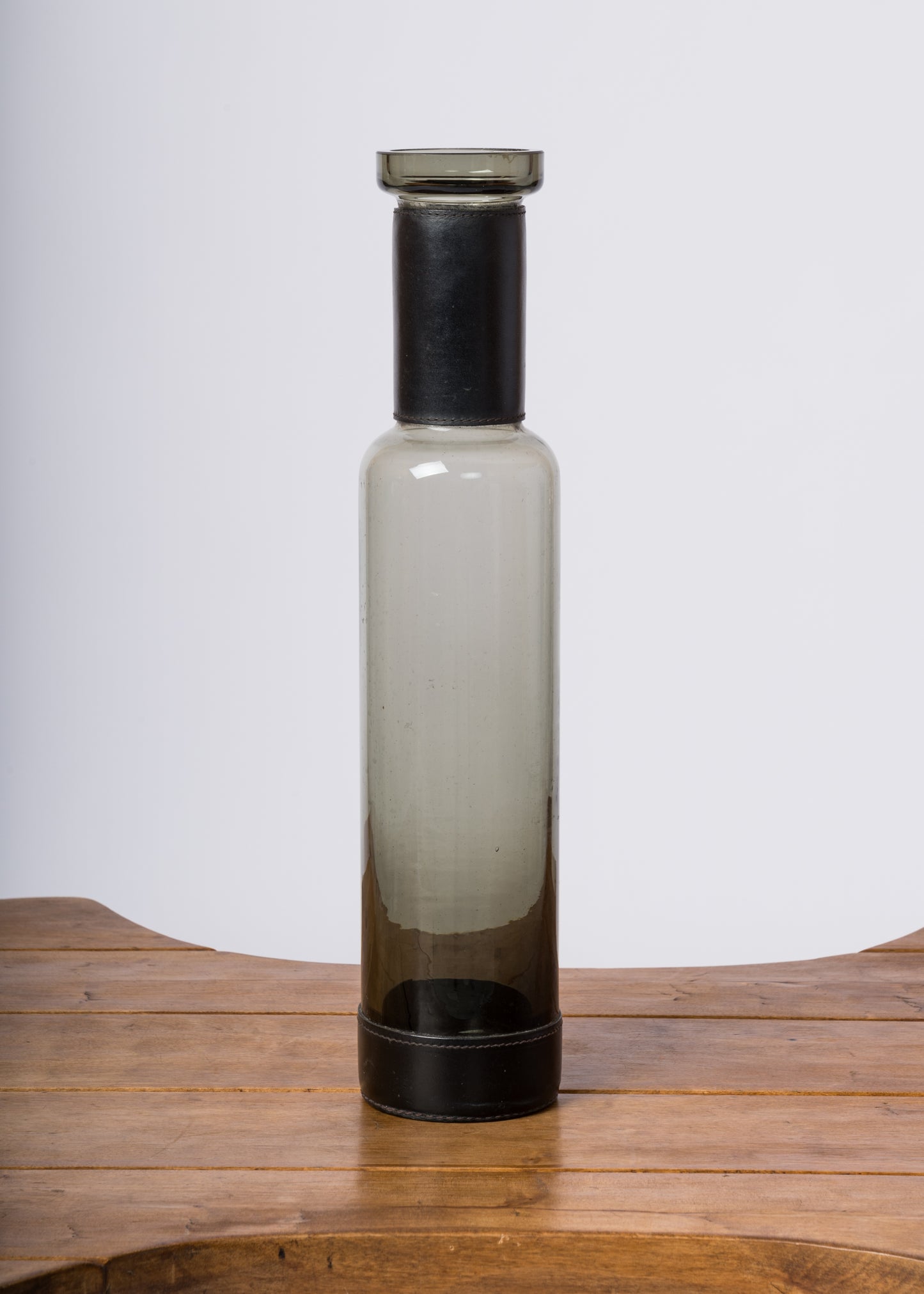 Smoked Black Glass & "Piqué Sellier" Stitched Leather Bottle - England 1960's