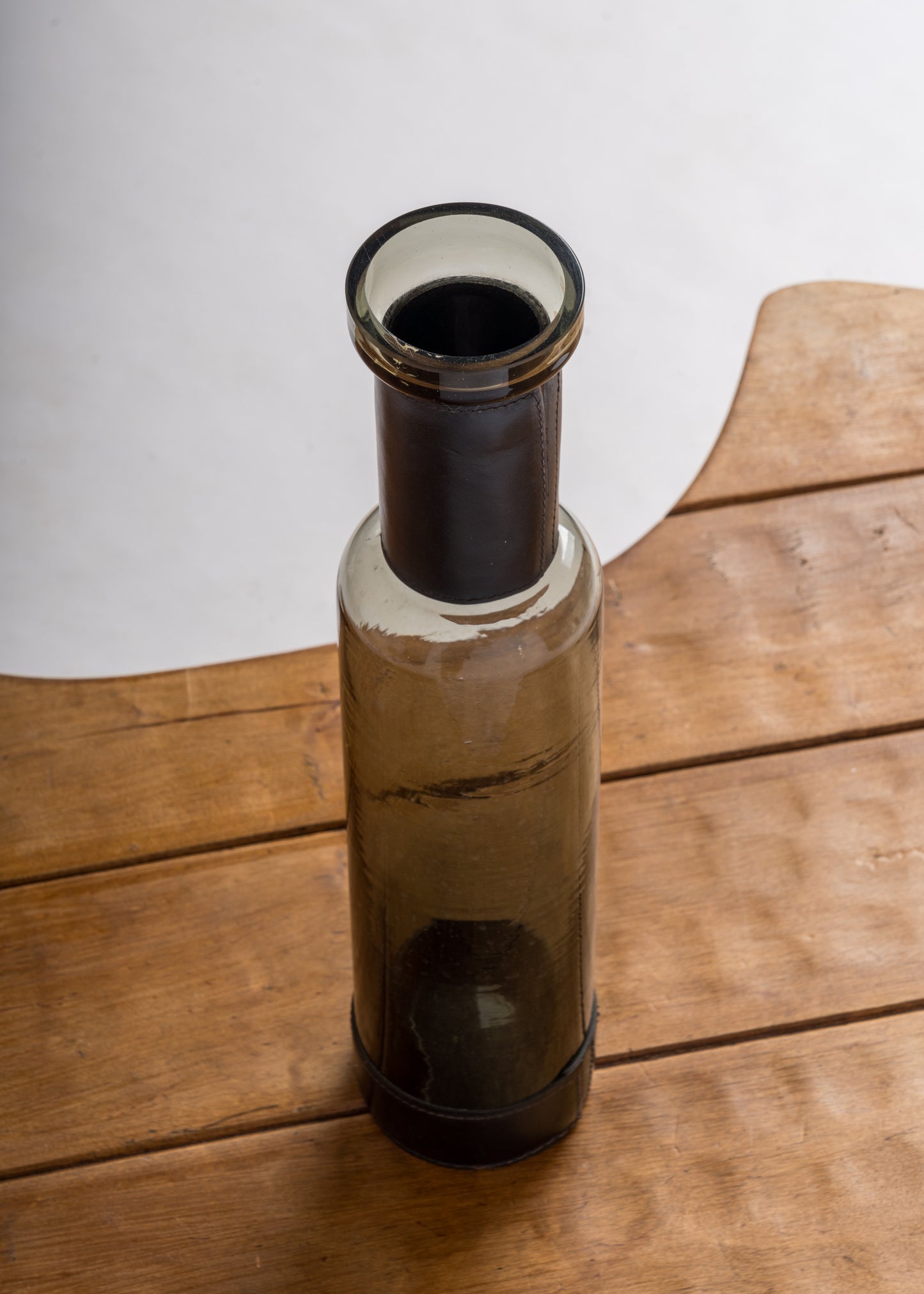 Smoked Black Glass & "Piqué Sellier" Stitched Leather Bottle - England 1960's