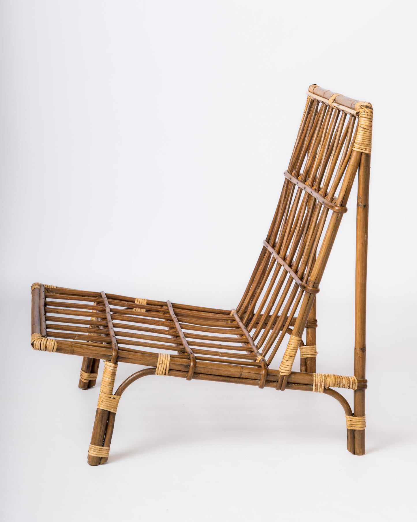 Single Rattan Mid Century Lounger in the style of Audoux Minnet - France 1960's