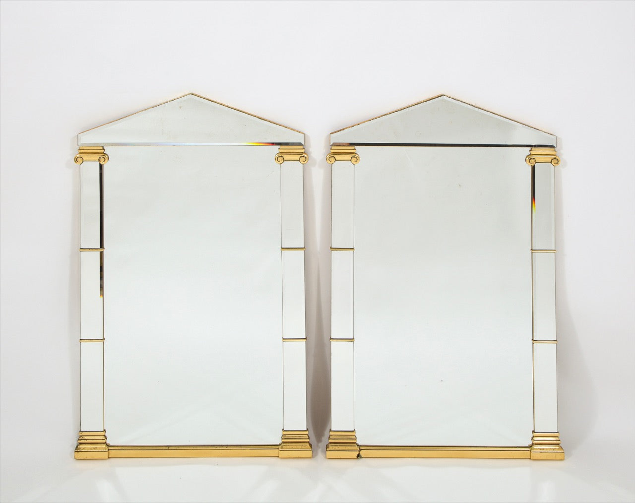 Pair of 1980's French Neoclassical Mirrors with Gilt Accents