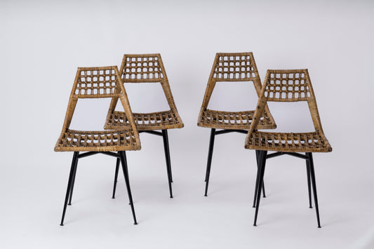 Set of four Rattan Basket Chairs by Lucien Carrier