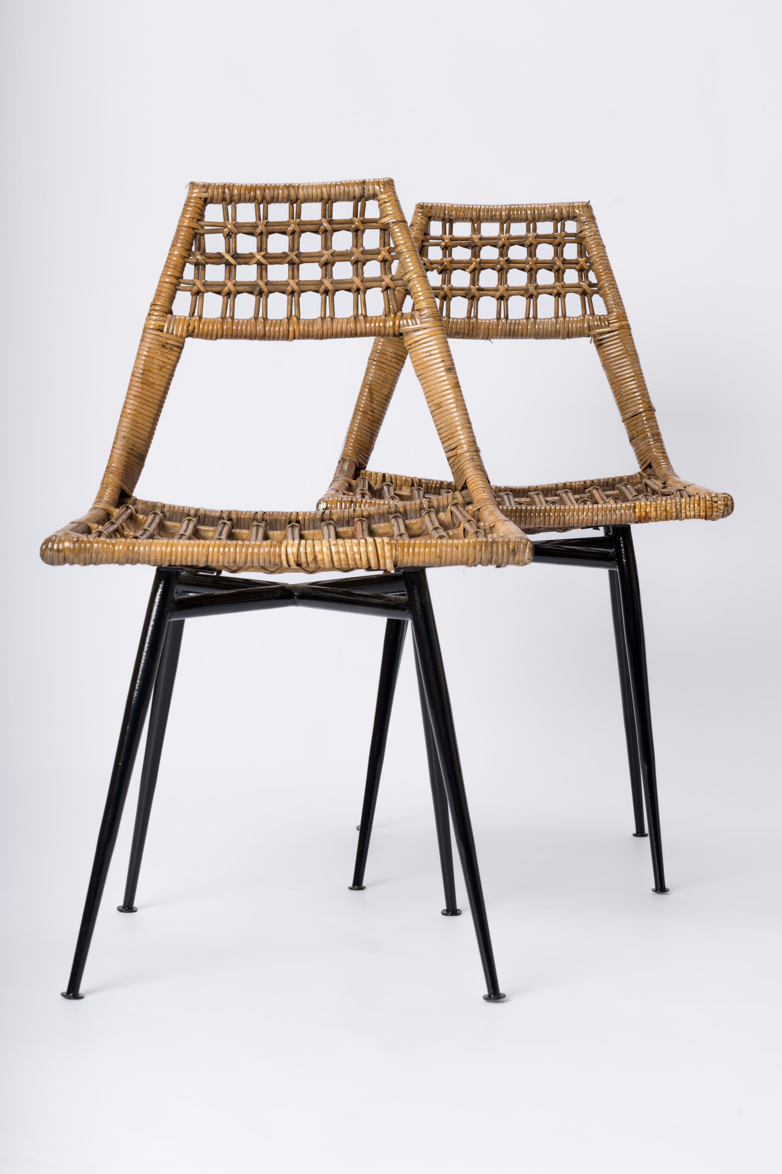 Set of four Rattan Basket Chairs by Lucien Carrier