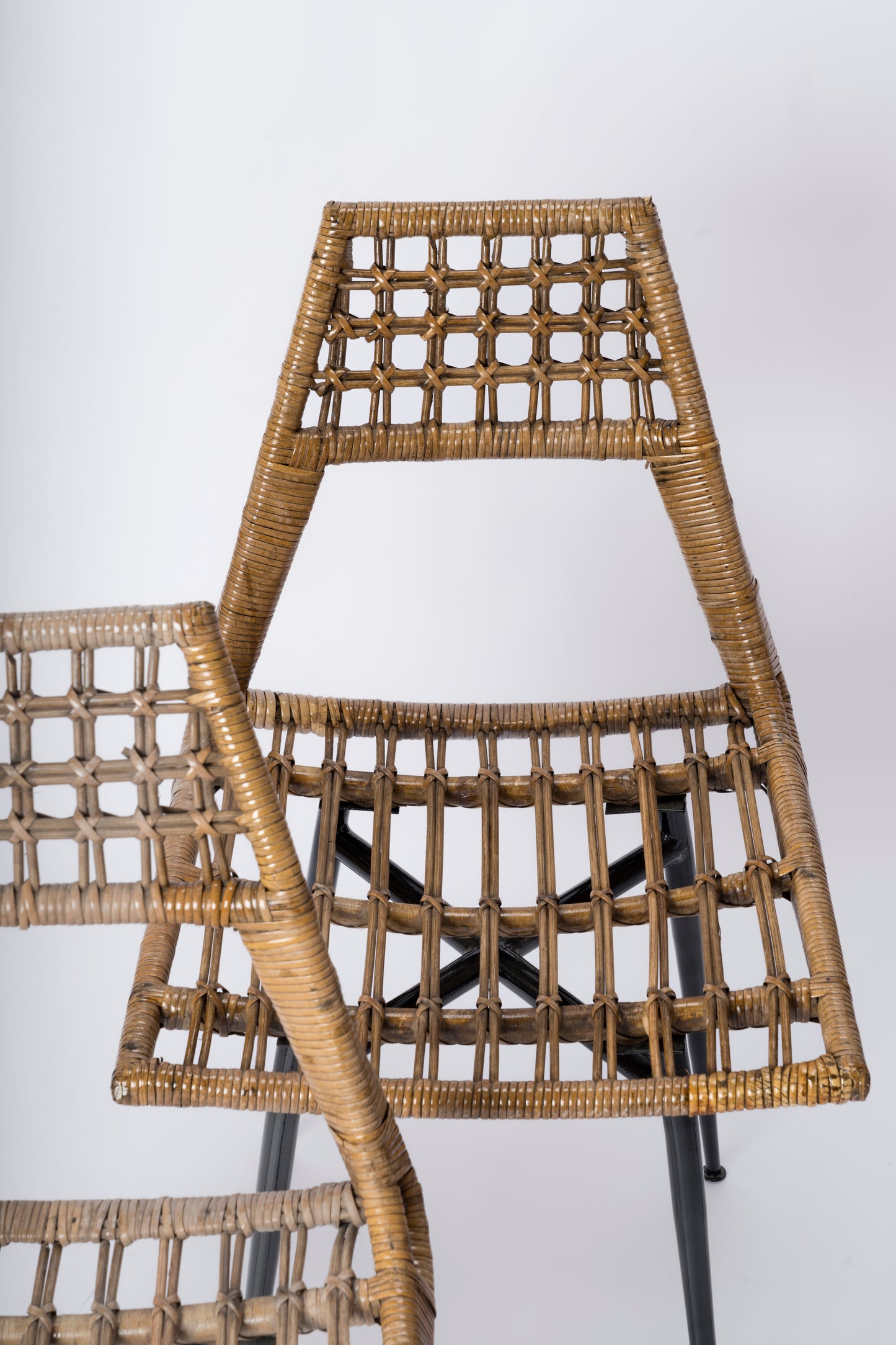 Set of four Rattan Basket Chairs by Lucien Carrier