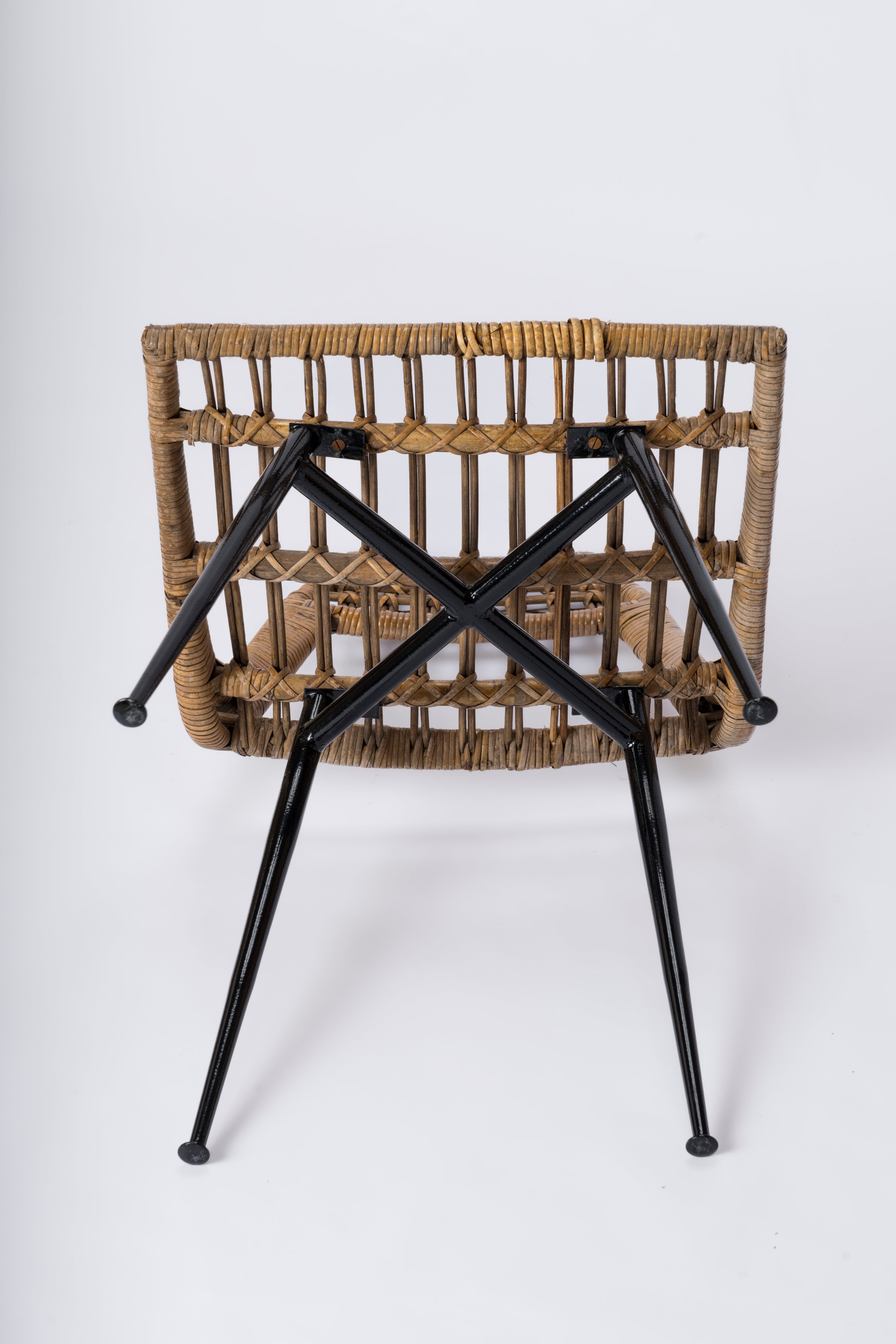 Set of four Rattan Basket Chairs by Lucien Carrier