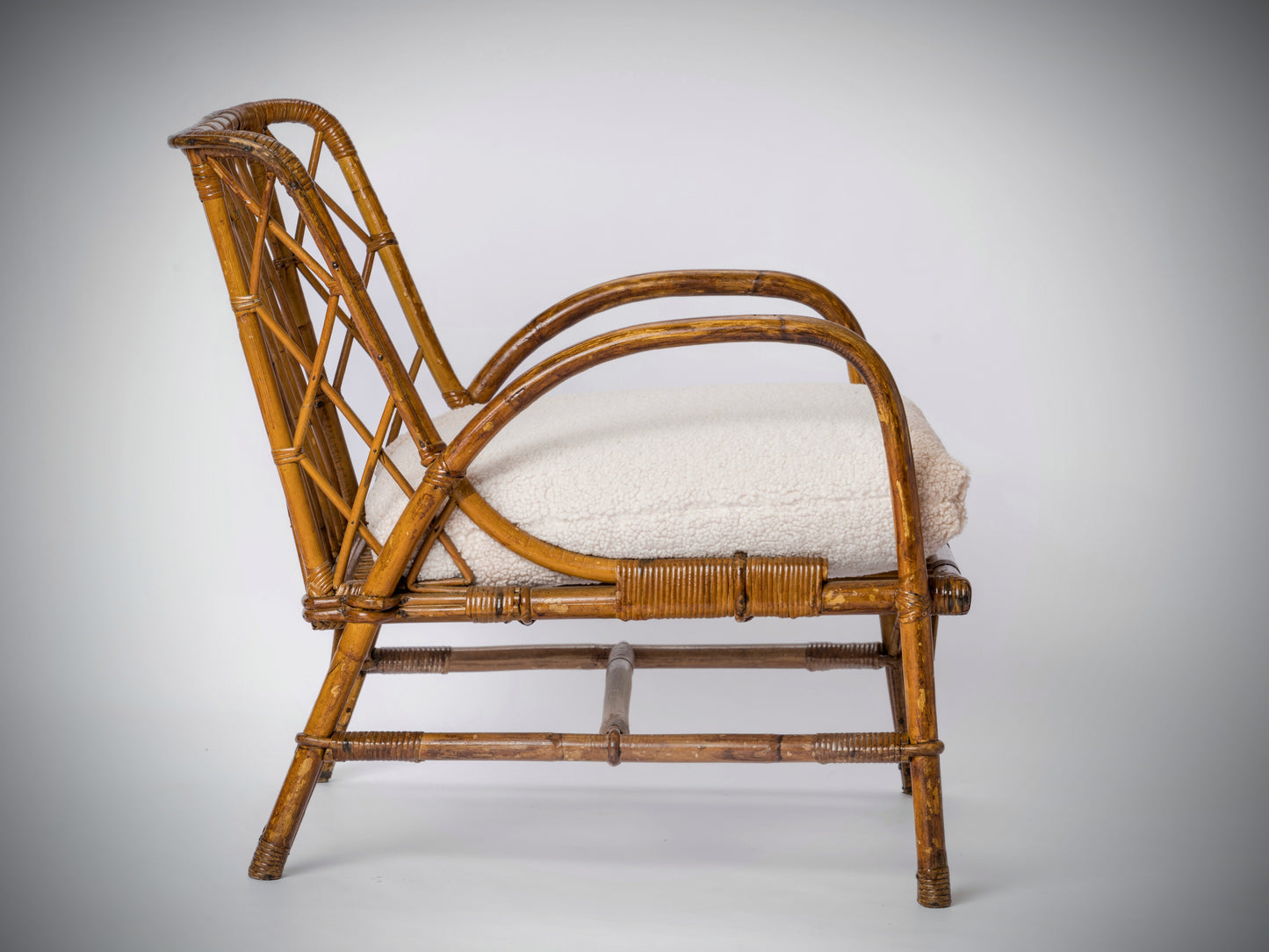 Mid-century Rattan Armchair by Jacques Quinet - France 1960's