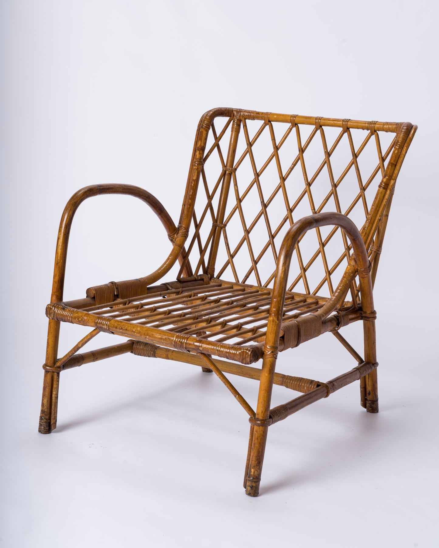 Mid-century Rattan Armchair by Jacques Quinet - France 1960's