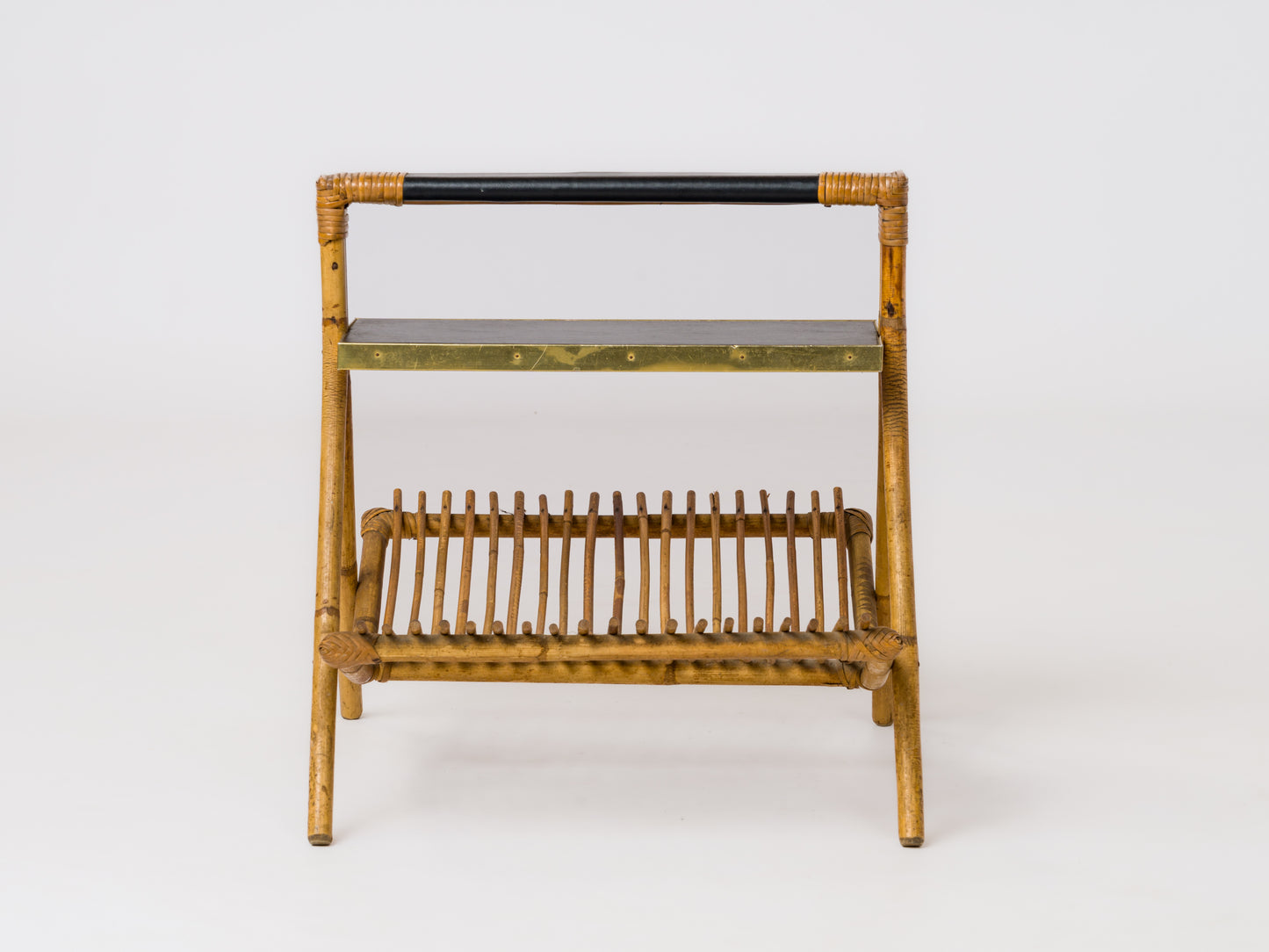Rattan, Brass & Moleskine Magazine Rack in the style of Quinet - France 1960's