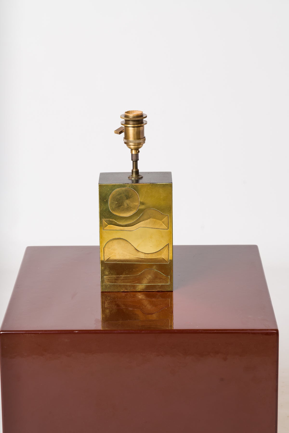 Engraved Brass Panel over Bois Noirci Table Lamp by Jean Blazy - France 1970's