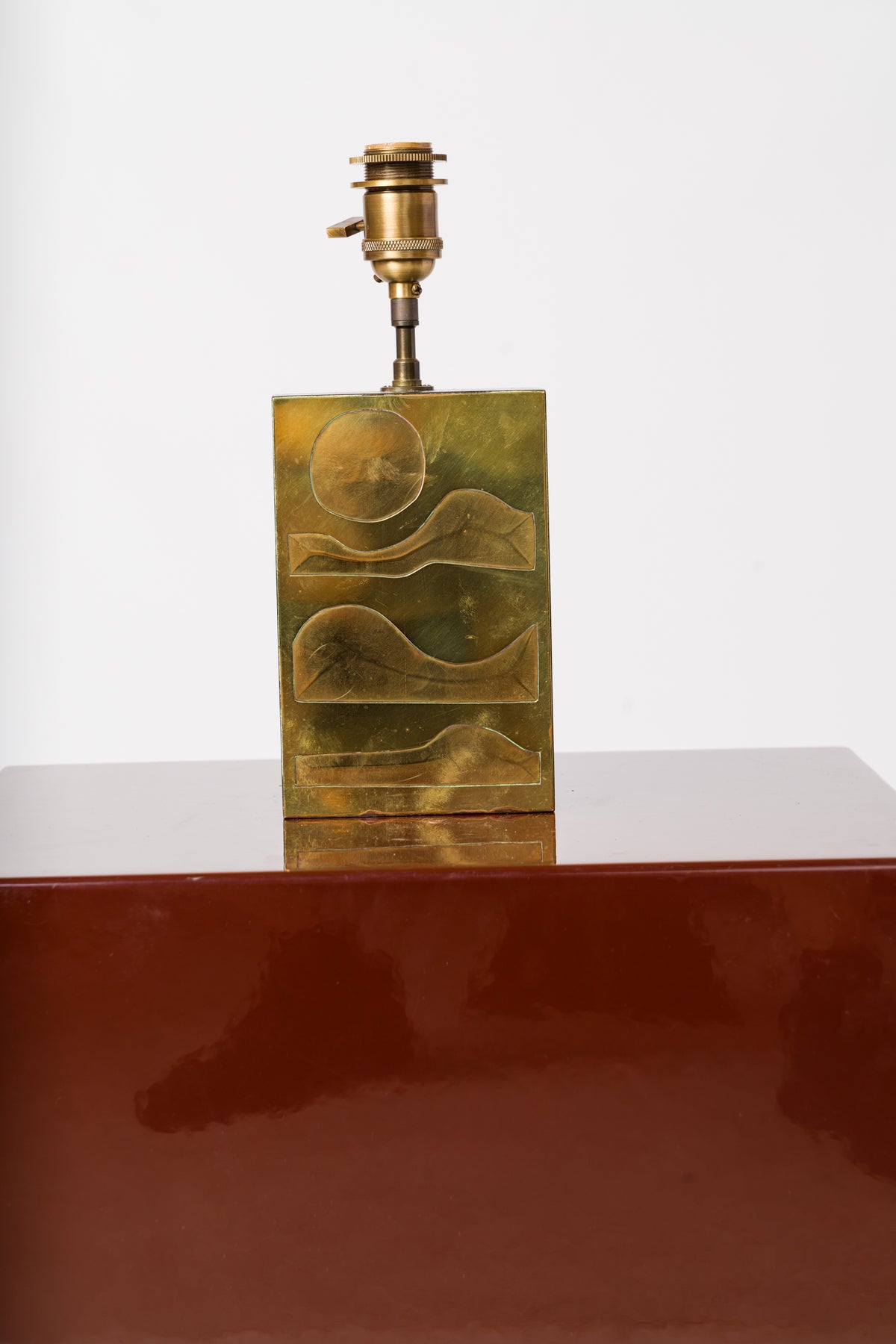 Engraved Brass Panel over Bois Noirci Table Lamp by Jean Blazy - France 1970's