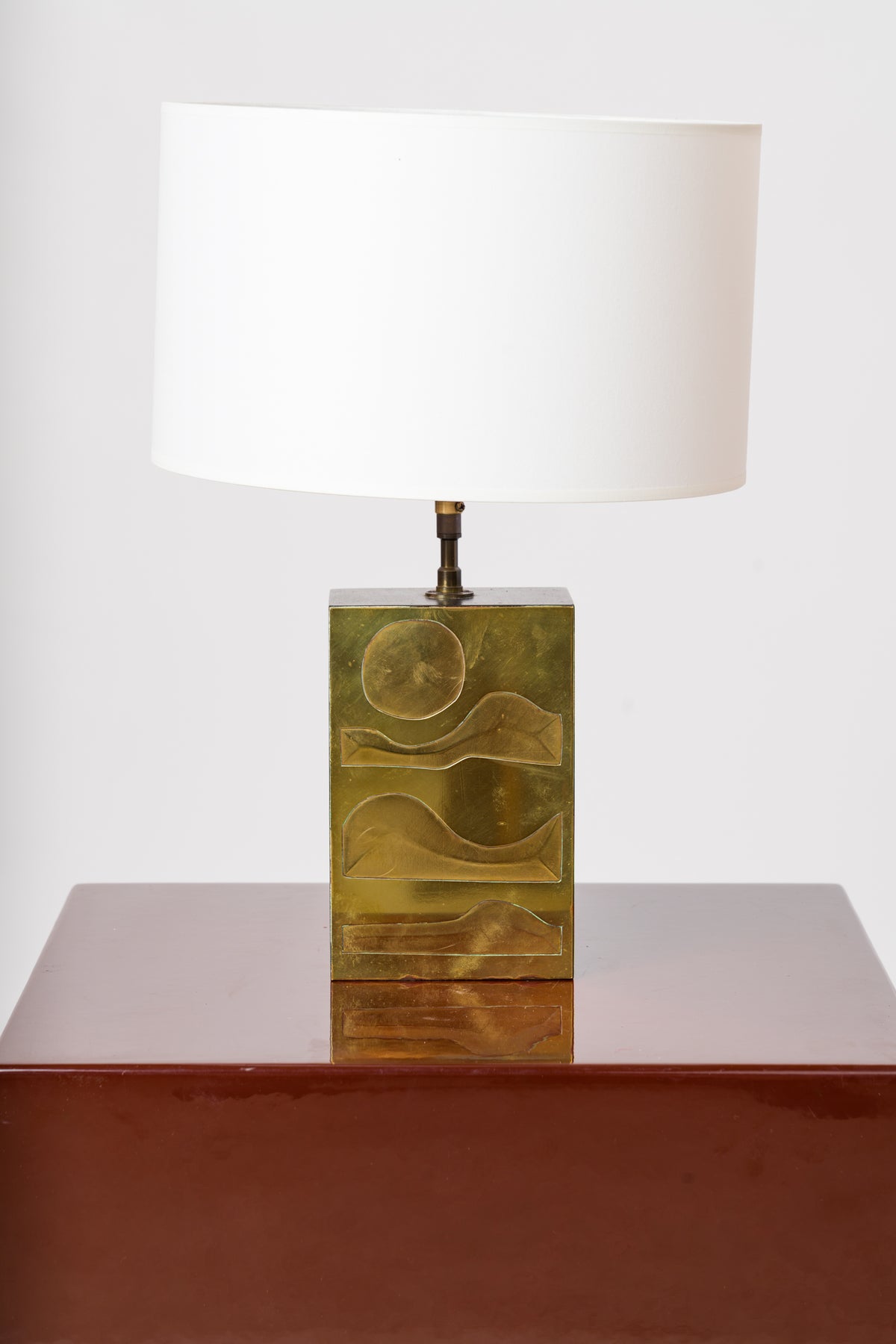 Engraved Brass Panel over Bois Noirci Table Lamp by Jean Blazy - France 1970's