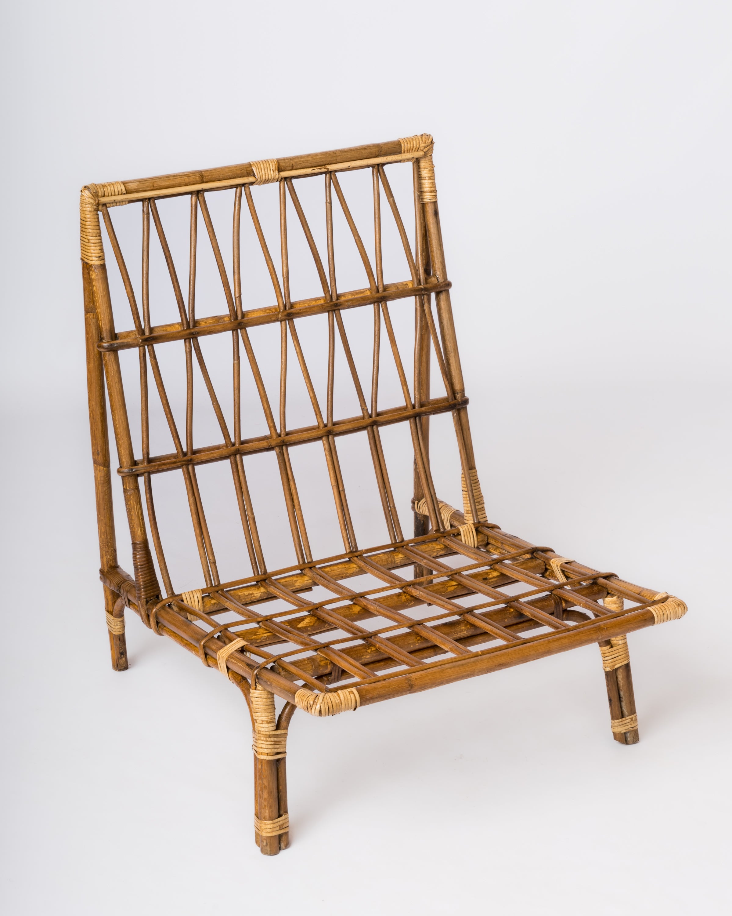 Single Rattan Mid Century Lounger in the style of Audoux Minnet - France 1960's