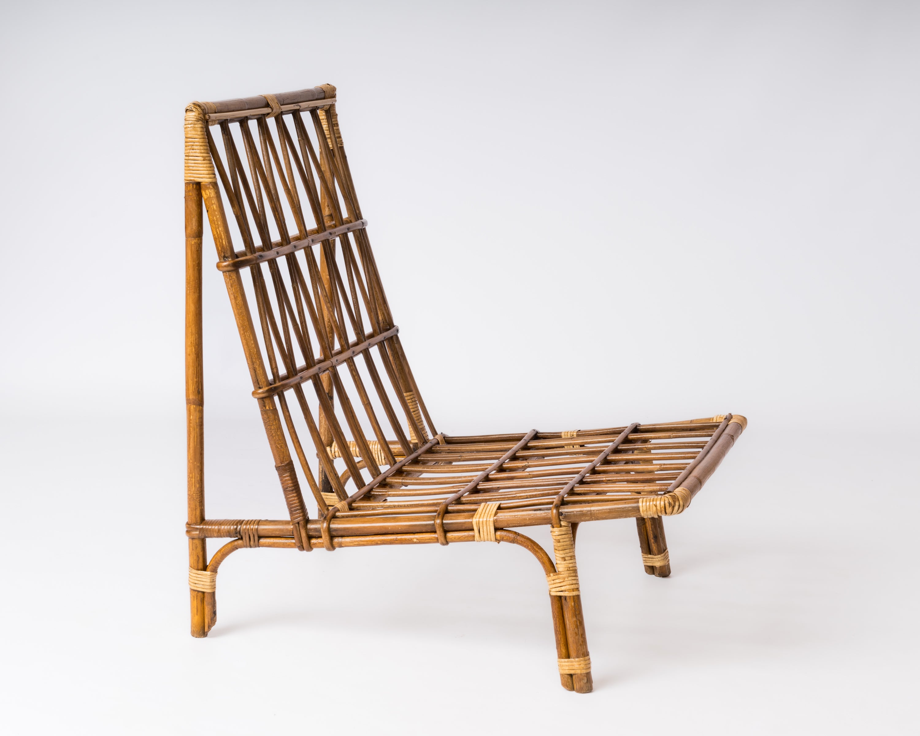 Single Rattan Mid Century Lounger in the style of Audoux Minnet - France 1960's