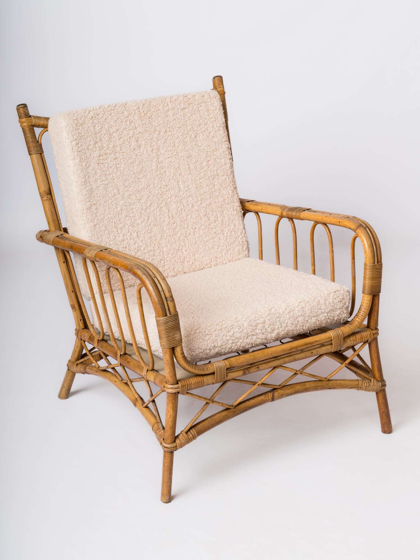 Single Rattan Armchair in the style of Louis Sognot - France 1960's