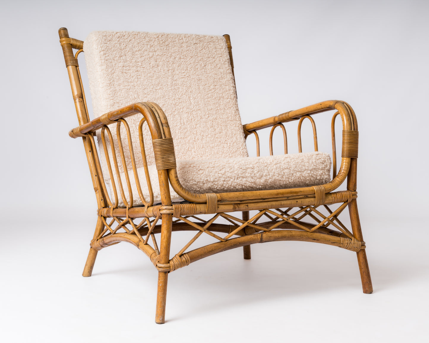 Single Rattan Armchair in the style of Louis Sognot - France 1960's