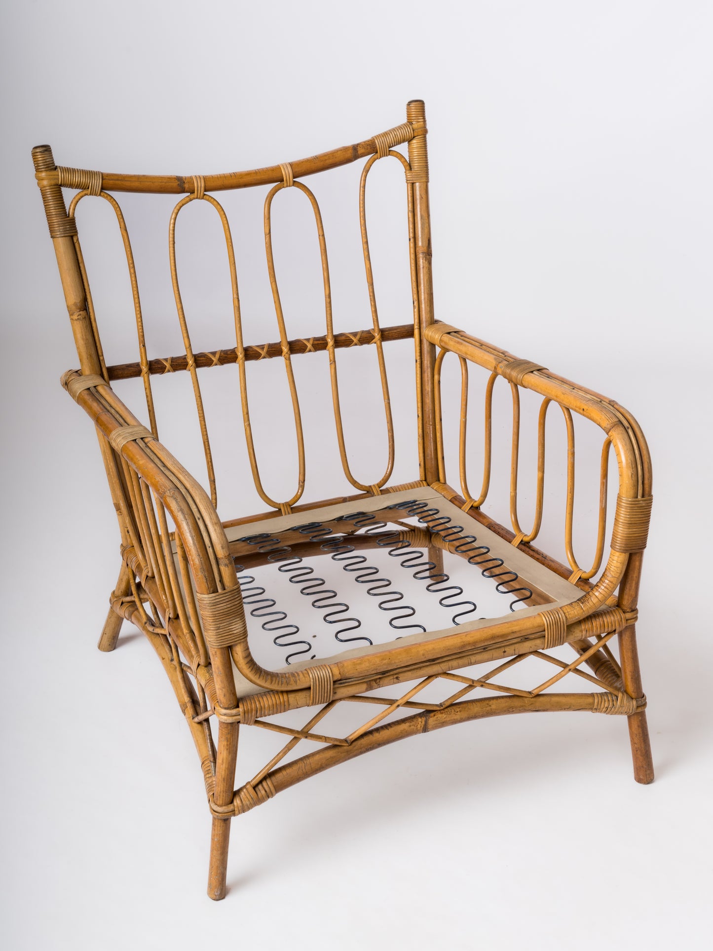 Single Rattan Armchair in the style of Louis Sognot - France 1960's