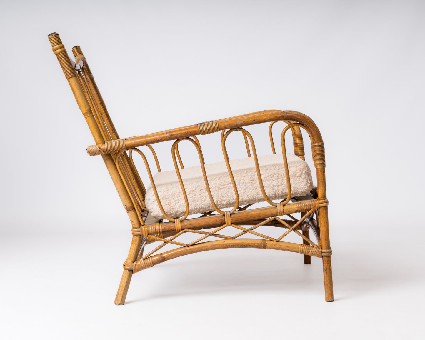 Single Rattan Armchair in the style of Louis Sognot - France 1960's