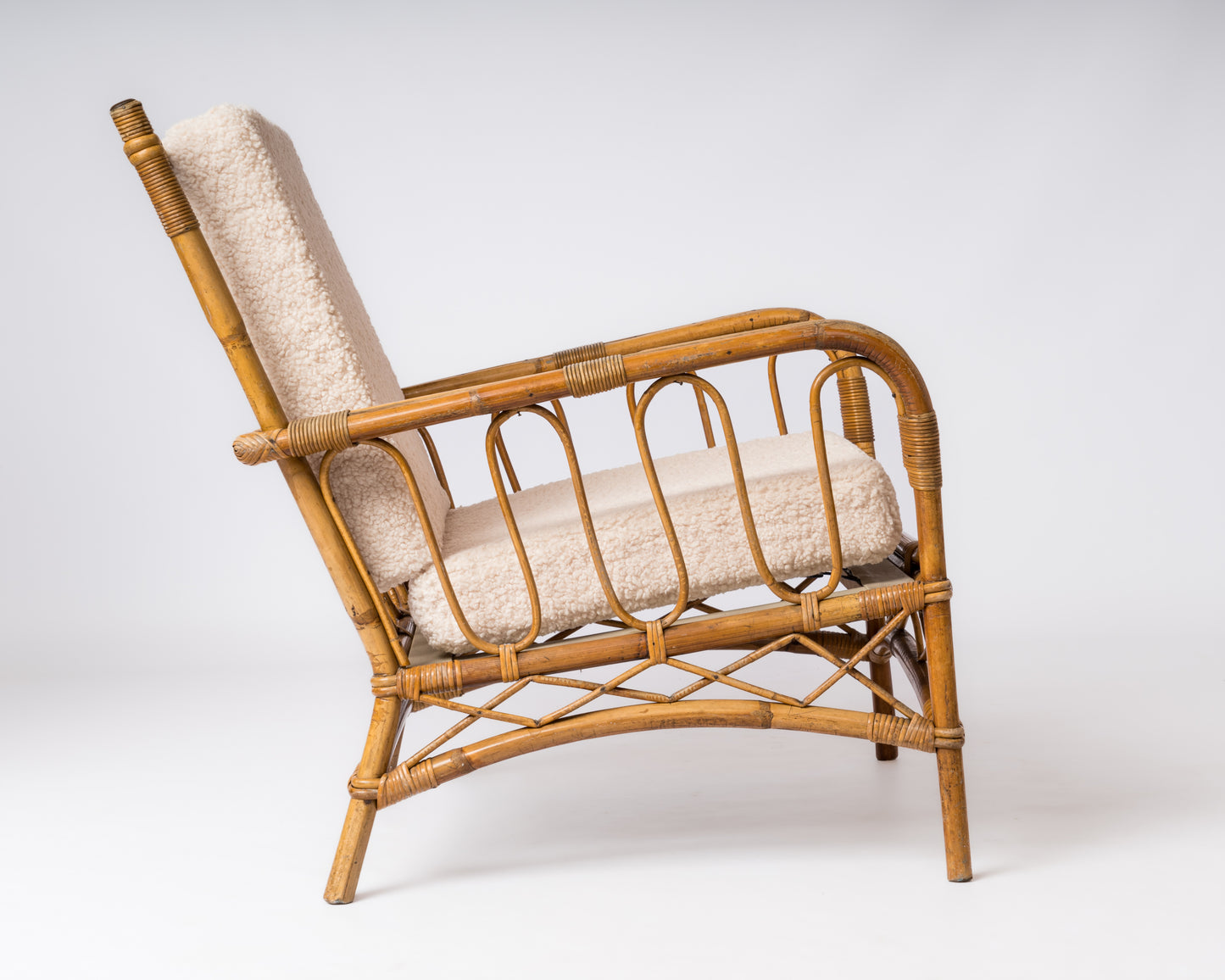 Single Rattan Armchair in the style of Louis Sognot - France 1960's