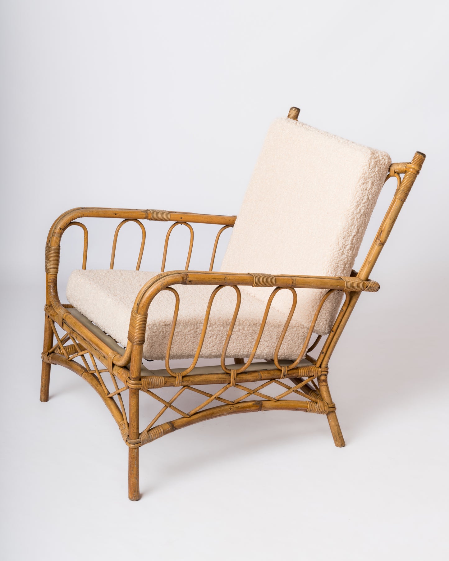 Single Rattan Armchair in the style of Louis Sognot - France 1960's