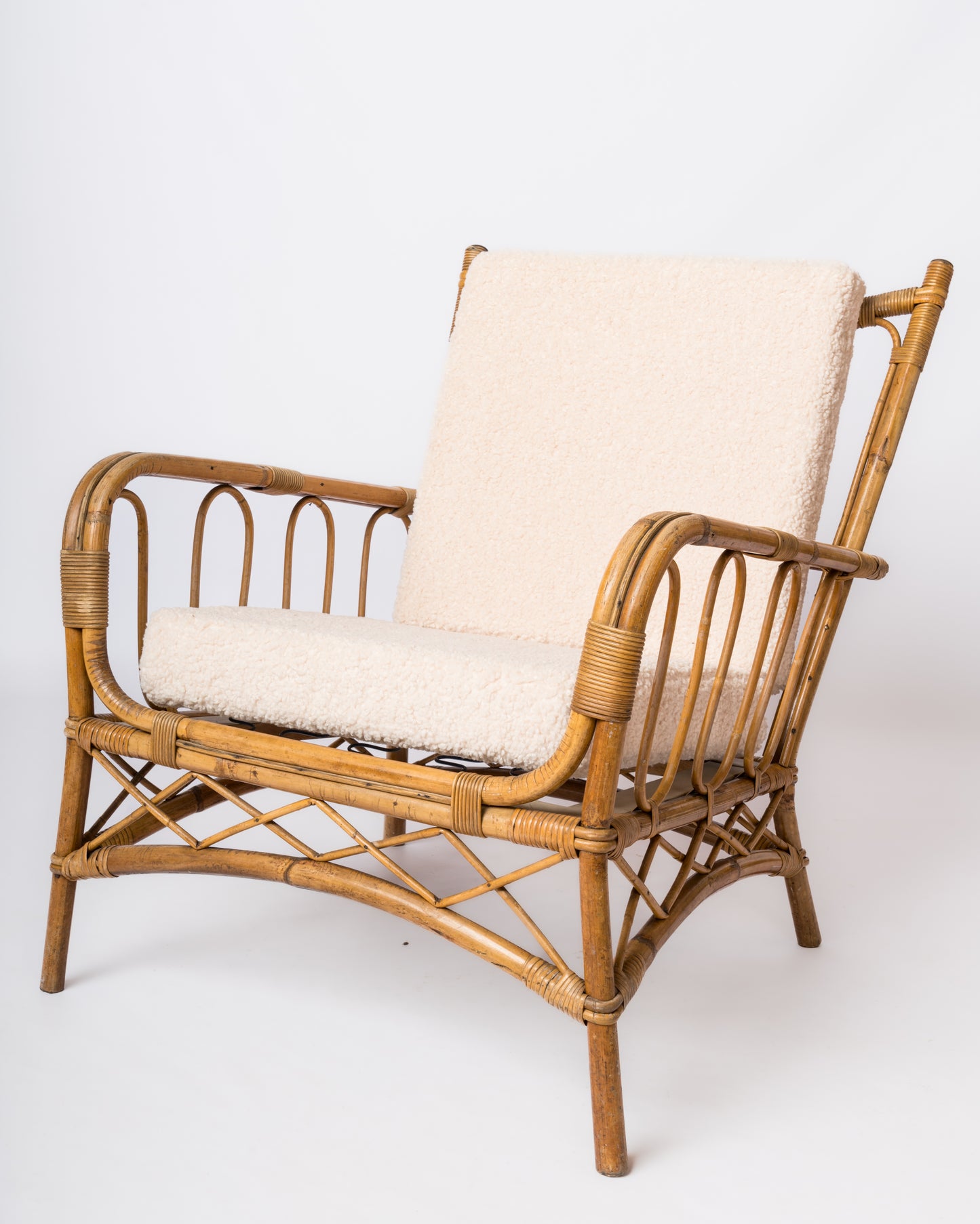 Single Rattan Armchair in the style of Louis Sognot - France 1960's